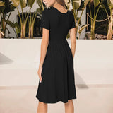 Robe à col ras du cou avec poche