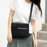 Sac à bandoulière léger avec plusieurs poches pour femme