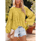 Elégant chemisier unicolore à manches longues