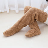 Chaussettes chauffantes aux genoux