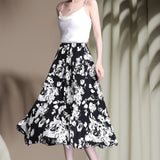 Jupe trapèze mi-longue coupe ajustée élastique simple