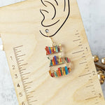 Boucles d'oreilles chat avec livres