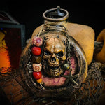 Bouteille de rhum tête de mort pirate en résine