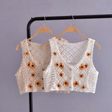 Gilet en tricot à marguerites