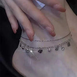 Bracelet de cheville incrusté de cristaux avec franges de diamants