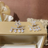 Boucles d'Oreilles Fleur Zircon Pompon