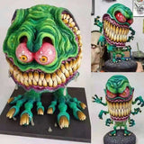 Statues de monstre à grande bouche en colère
