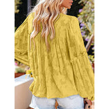 Elégant chemisier unicolore à manches longues