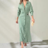 Robe à revers à manches longues de couleur unie