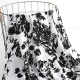 Jupe trapèze mi-longue coupe ajustée élastique simple