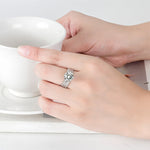 Bague six griffes classique torsadée en diamant