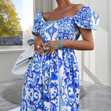 Robe bohémienne à encolure dégagée