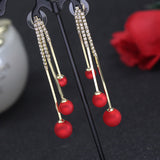 Boucles d'oreilles piercing élégantes pompon