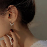 Boucles d'oreilles élégantes en perles