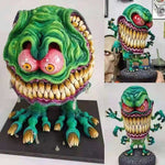 Statues de monstre à grande bouche en colère
