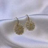 Boucles d'oreilles marguerites élégantes