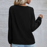 Chemise en mousseline de soie à manches longues de couleur unie