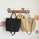 Sac à bandoulière en toile sobre de grande capacité