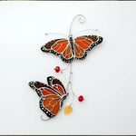 Décor de fenêtre en verre papillon monarque teinté