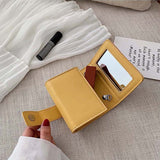 Mini sac à cosmétiques à bandoulière