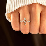 Bague enveloppante croix micro pavée