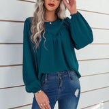 Chemisier uni à manches bouffantes et encolure ronde