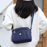 Sac à bandoulière monochrome simple à la mode en nylon