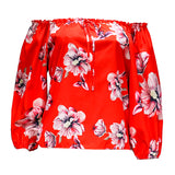 Haut fleuri à épaules dénudées et ourlet volanté