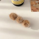 Clip de Bec de Canard en Boule de Poils