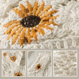 Gilet en tricot à marguerites