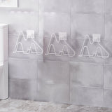 Porte-pantoufles adhésif mural