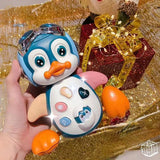 Jouet musical pingouin rampant