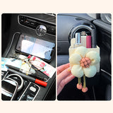 Boîte de rangement de sortie d'air de fleur de voiture