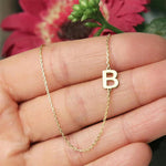 Collier à diamants avec lunette pour les initiales