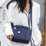 Sac à bandoulière monochrome simple à la mode en nylon