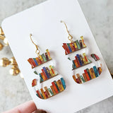 Boucles d'oreilles chat avec livres