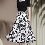 Jupe trapèze mi-longue coupe ajustée élastique simple