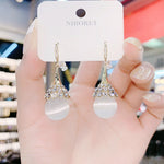 Boucles D'oreilles En Perles D'opale Á La Mode