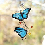 Décor de fenêtre en verre papillon monarque teinté