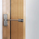 Ferme-porte automatique à ressort monté