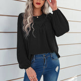 Chemisier uni à manches bouffantes et encolure ronde