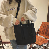 Sac à bandoulière en toile sobre de grande capacité