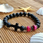 Bracelet de perles d'ambre à croix intérieure