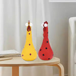 Décoration de poulet avec un long cou et de grands yeux