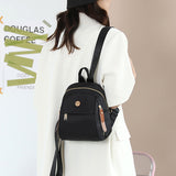 Mini sac à dos de couleur unie