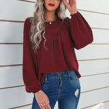 Chemisier uni à manches bouffantes et encolure ronde