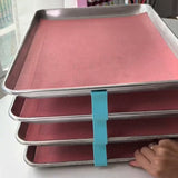 Empileurs de feuilles de cuisson