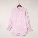 Chemise rayée à col montant et manches longues