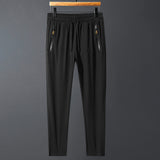 Pantalon de survêtement élastique à séchage rapide