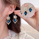 Boucles d'Oreilles Fleur Zircon Rhombique Saphir